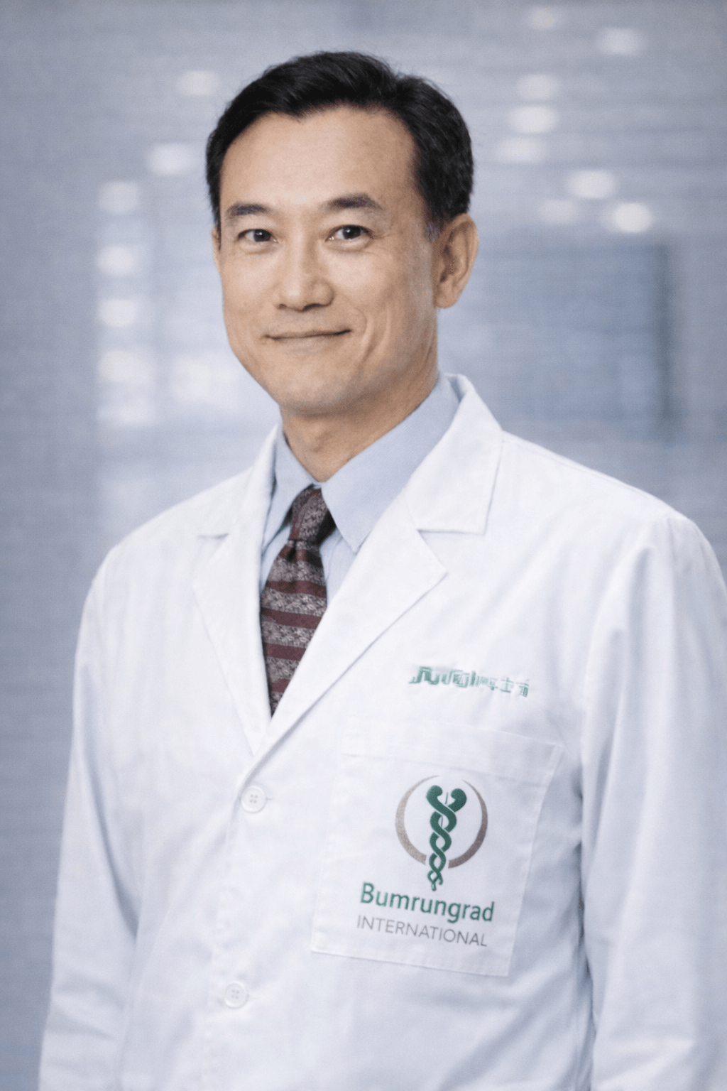 Dr. Apichat